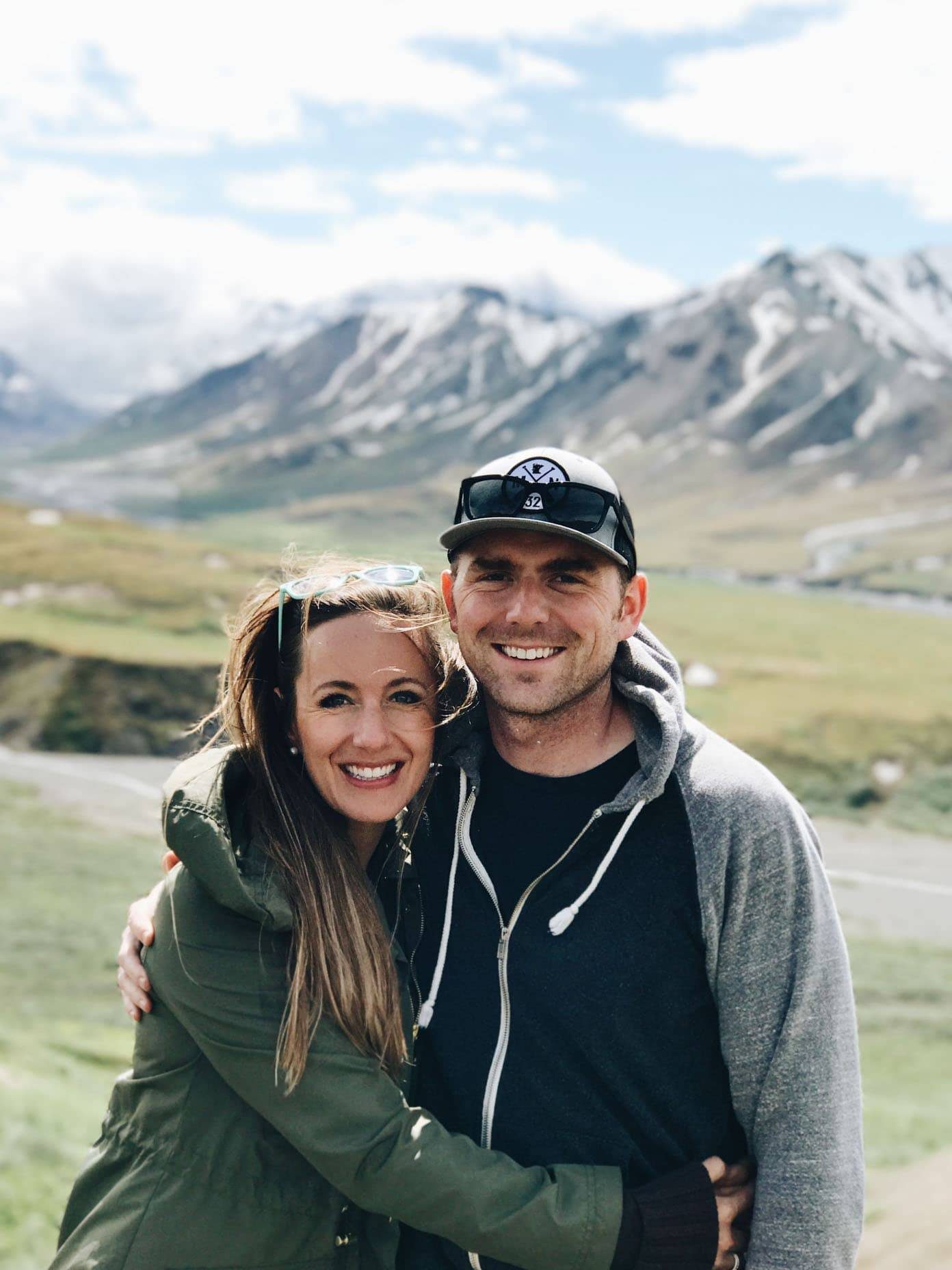 Man and woman smiling.