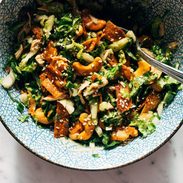 Napa chicken salad in a bowl with a fork