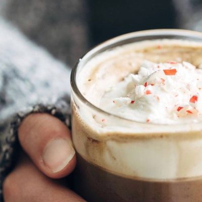 Peppermint Mocha held in hands.