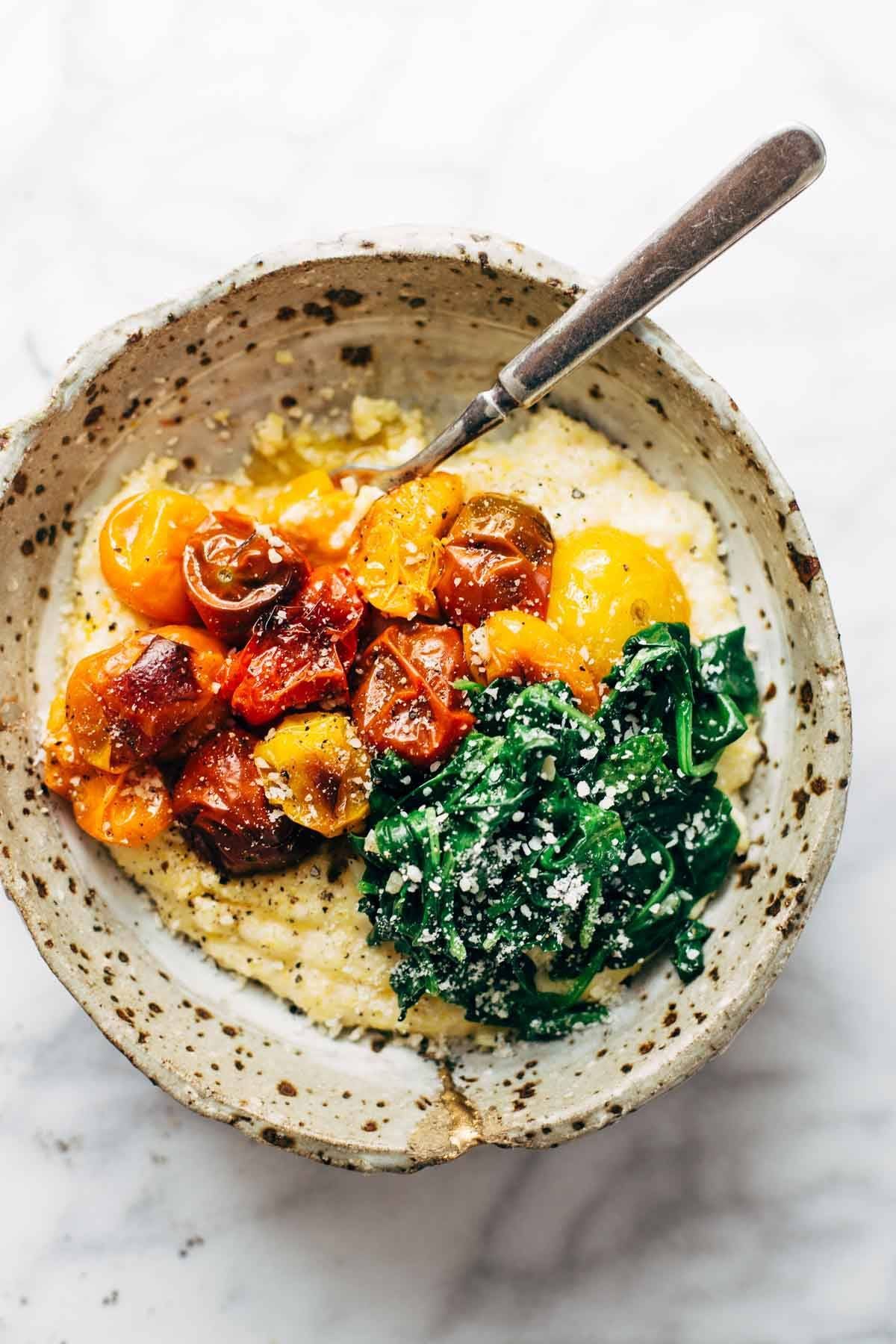 Roasted Tomatoes with Goat Cheese Polenta! Fresh, juicy tomatoes, vibrant green spinach, and a creamy goat cheese polenta! | pinchofyum.com Roasted Tomatoes with Goat Cheese Polenta! Fresh, juicy tomatoes, vibrant green spinach, and a creamy goat cheese polenta! | pinchofyum.com