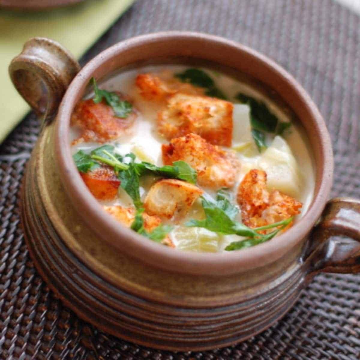 Smoky paprika croutons on soup in a bowl.