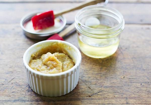 Hummus in a white dish.