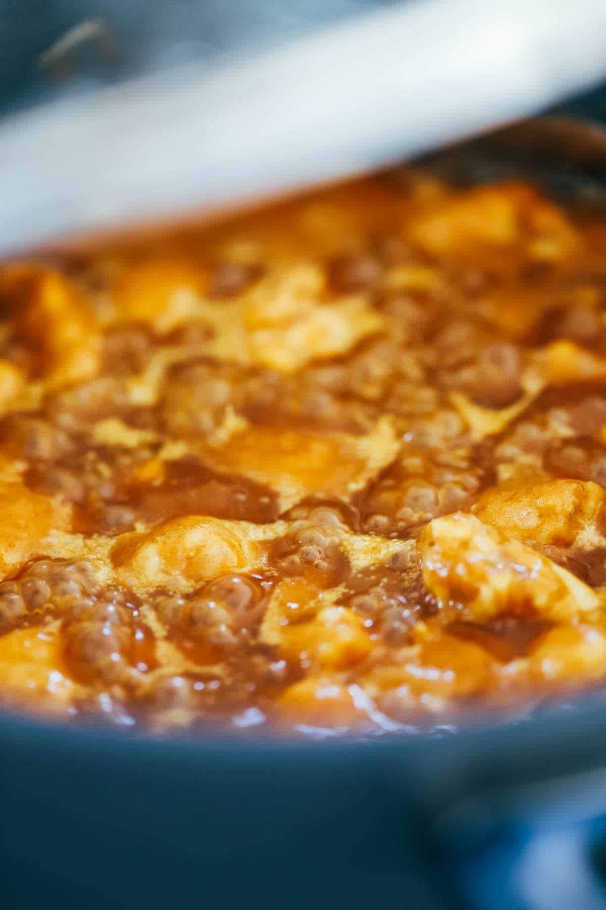 Sauce boiling in a pot.