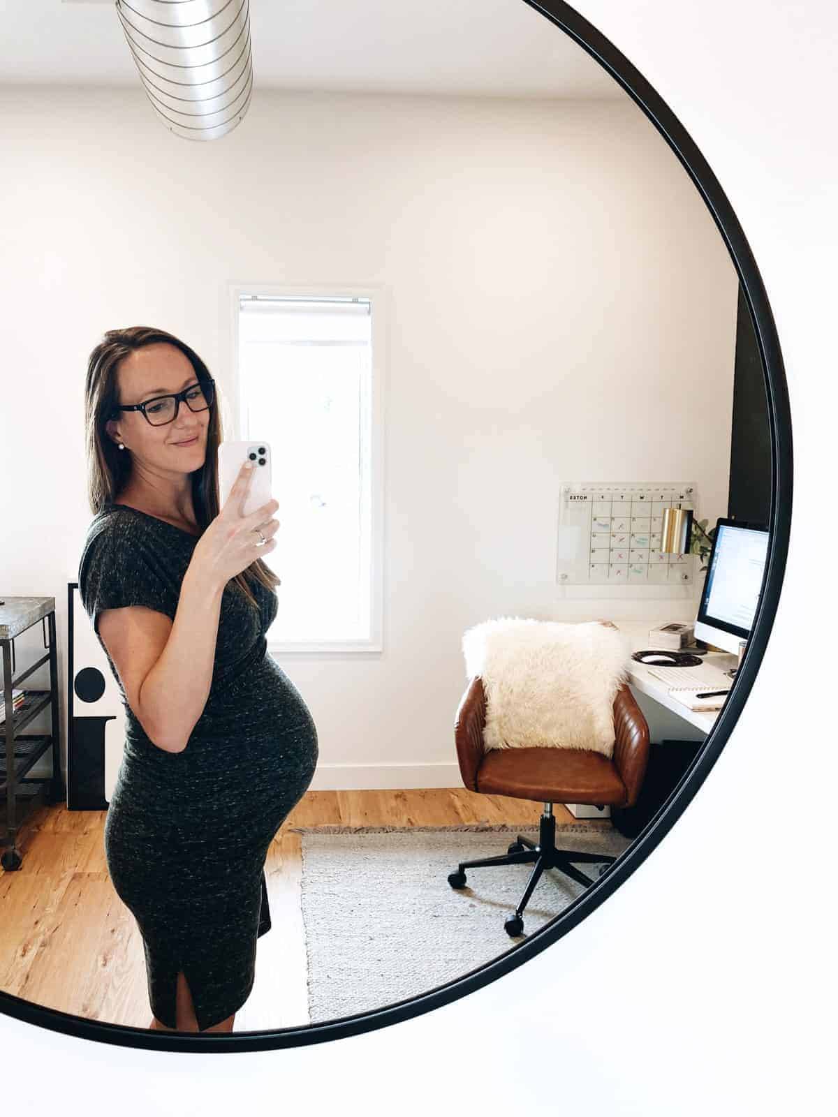 Lindsay taking selfie in an office.