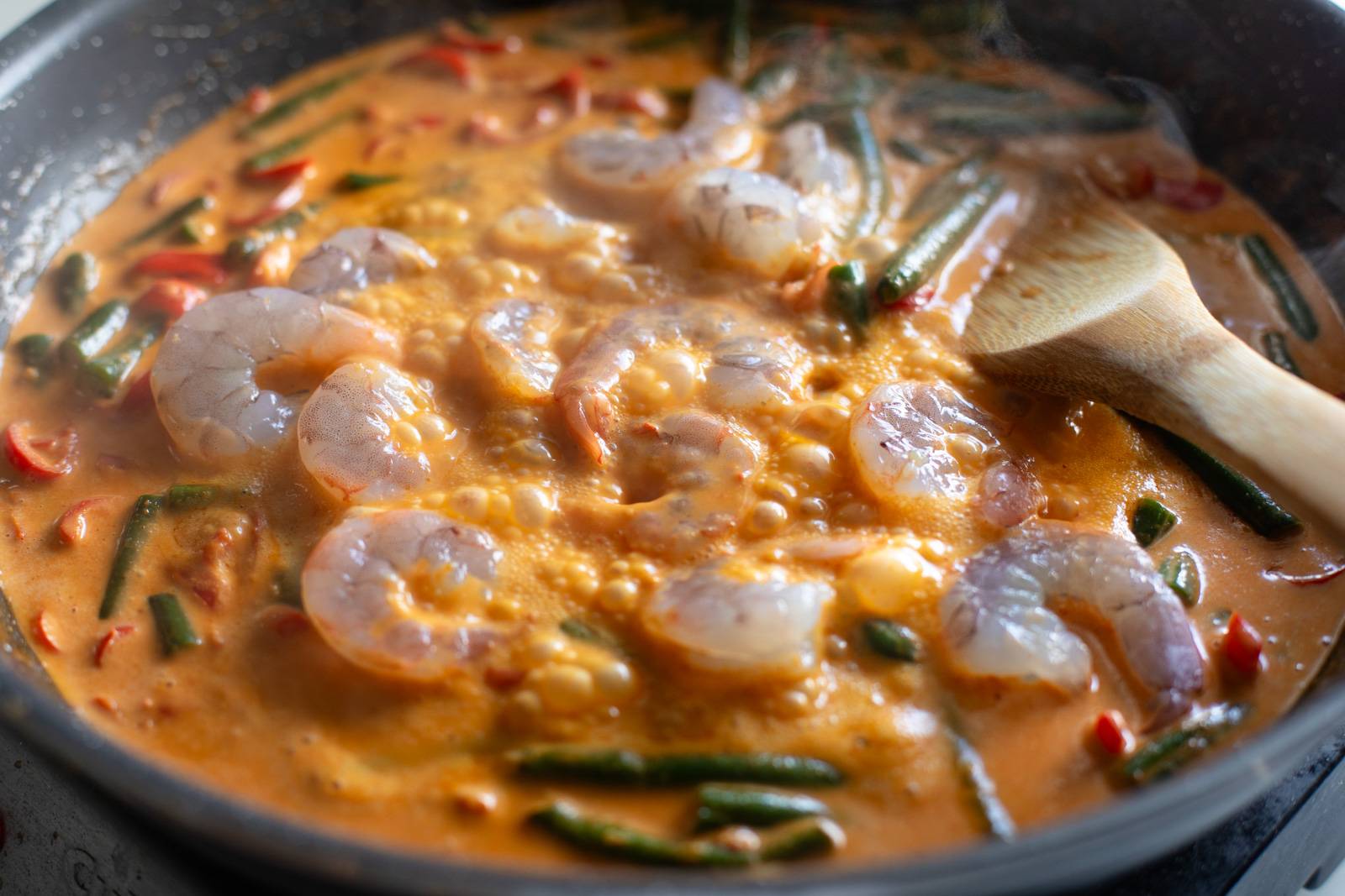 Shrimp curry in a pan.