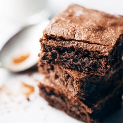 Espresso Brownies stacked on a plate.